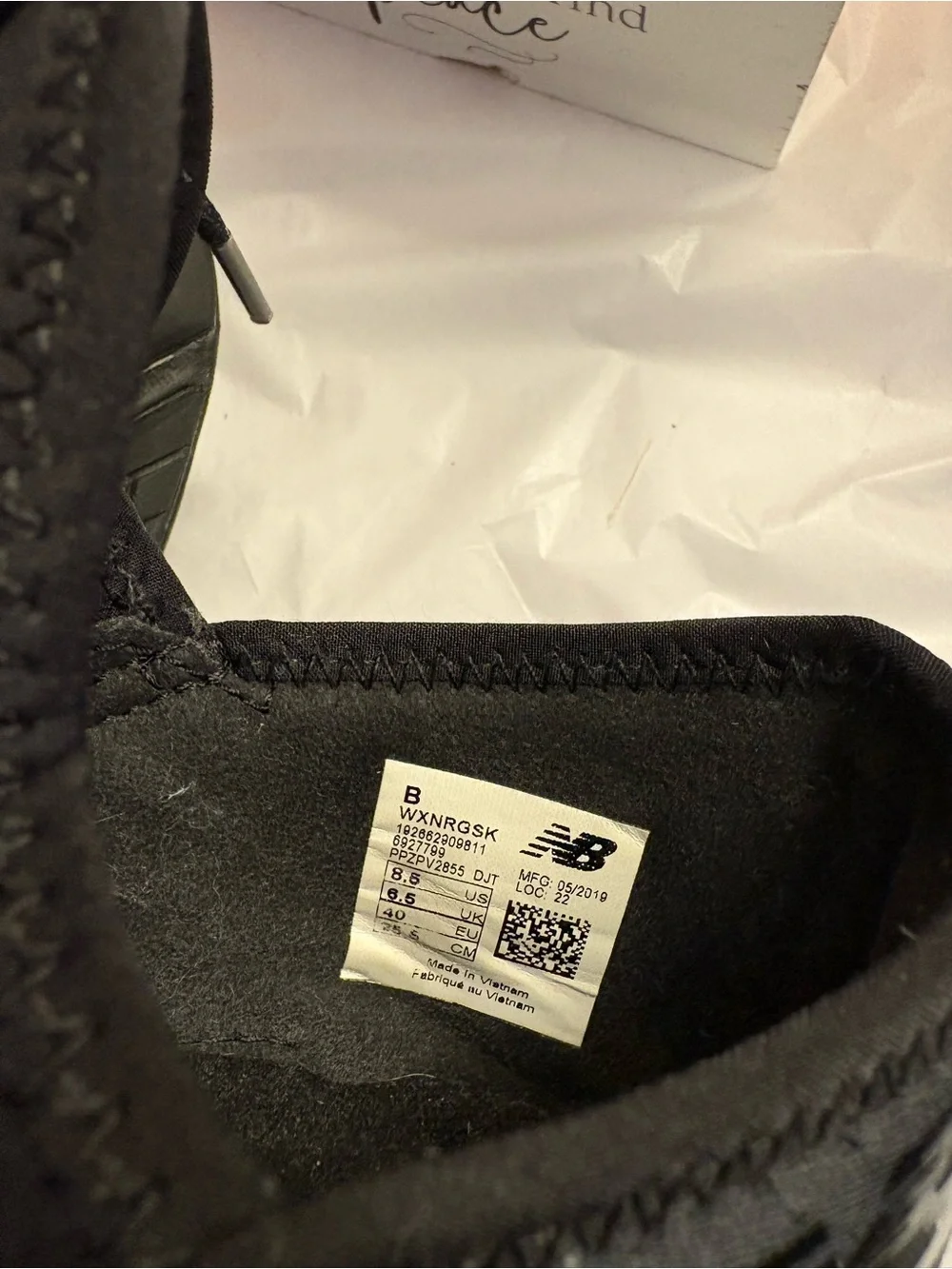 New Balance Woman’s Black Slip-On Knit Sneakers